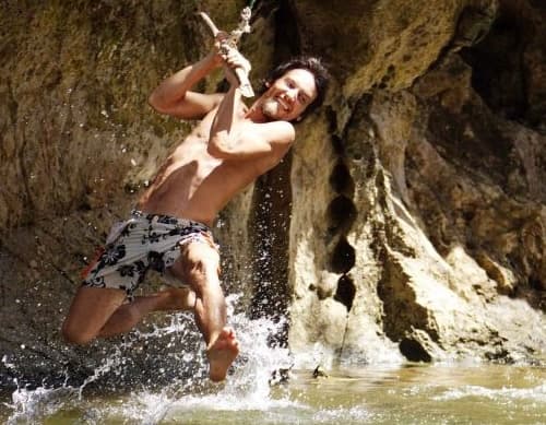 Swinging from a rope and jumping into the Khao Sok river