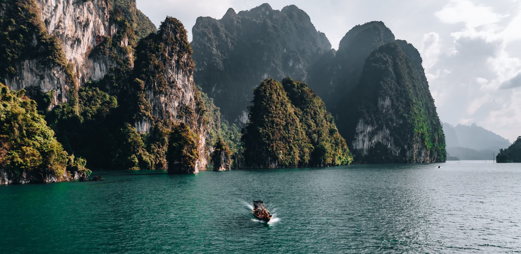 Drone view of longtail boat on Cheow Lan Lake
