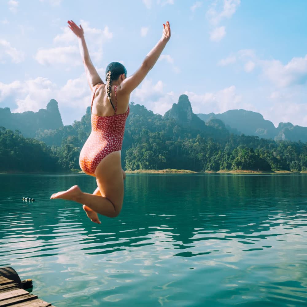 Jumping into Cheow Lan Lake