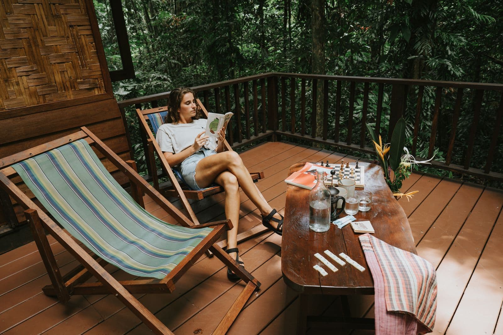 Forest treehouse balcony with chairs