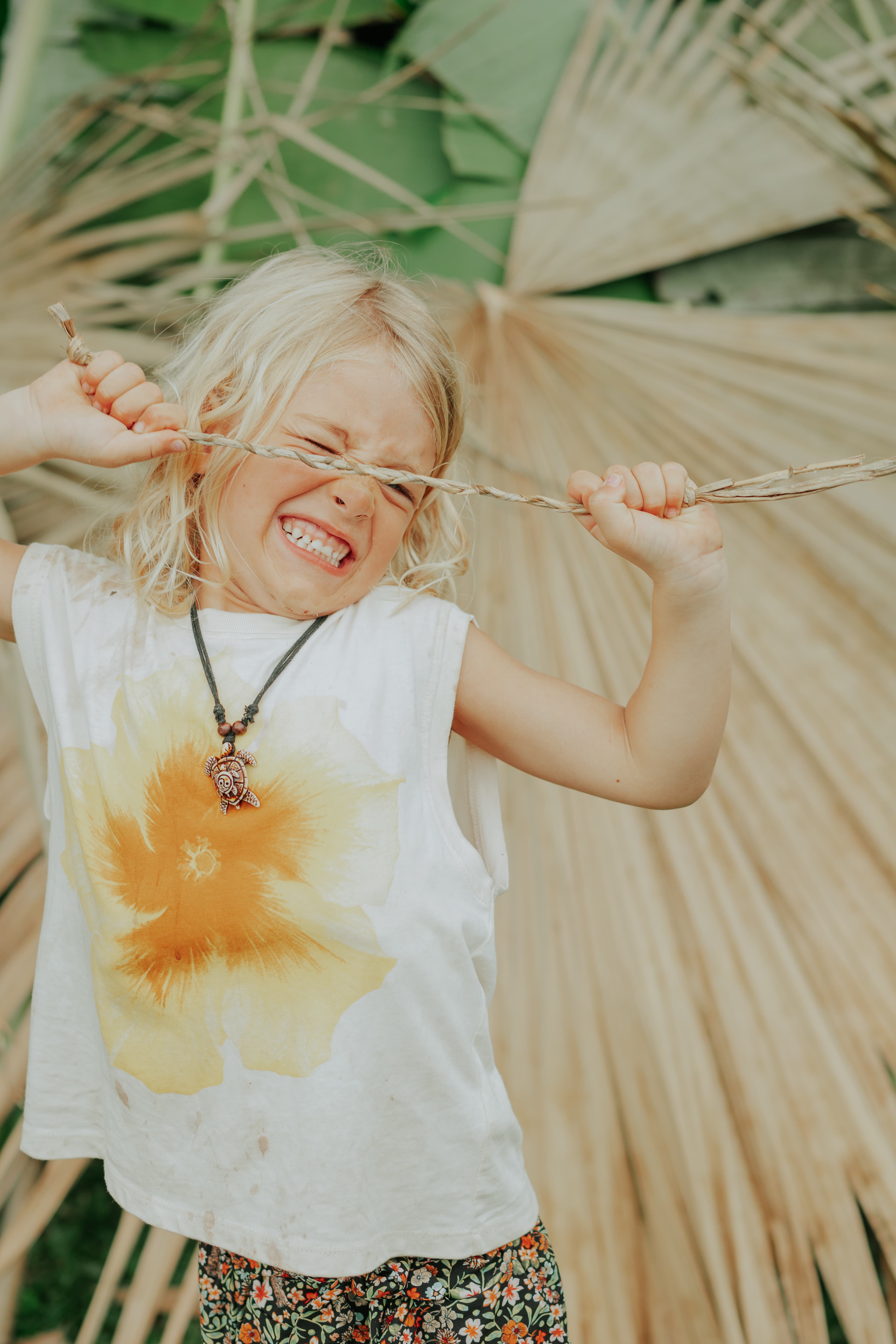 Kids painting and decorating with flowers