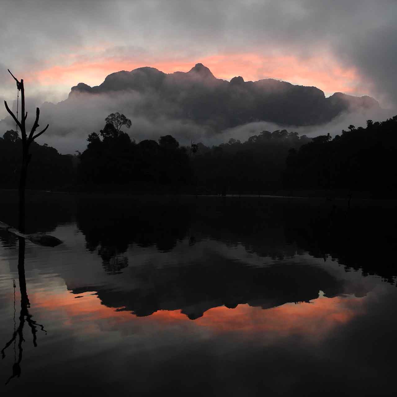 Beautiful clouded susent over Cheow Larn lake