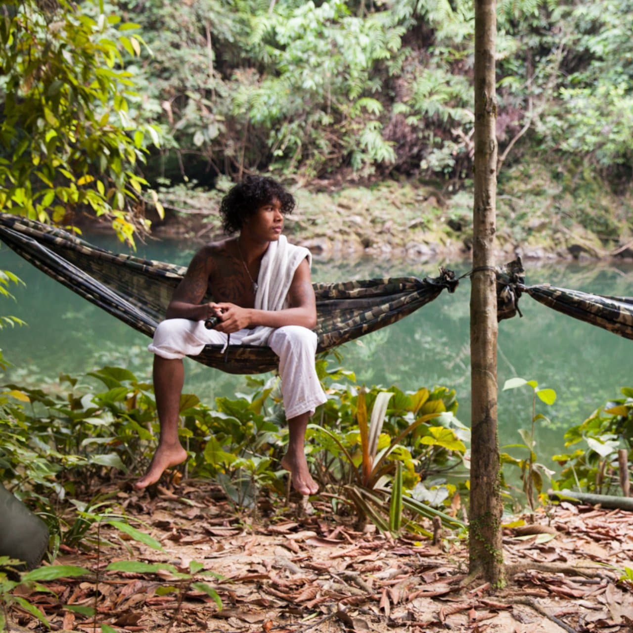 Sitting in a hammock in the jungle