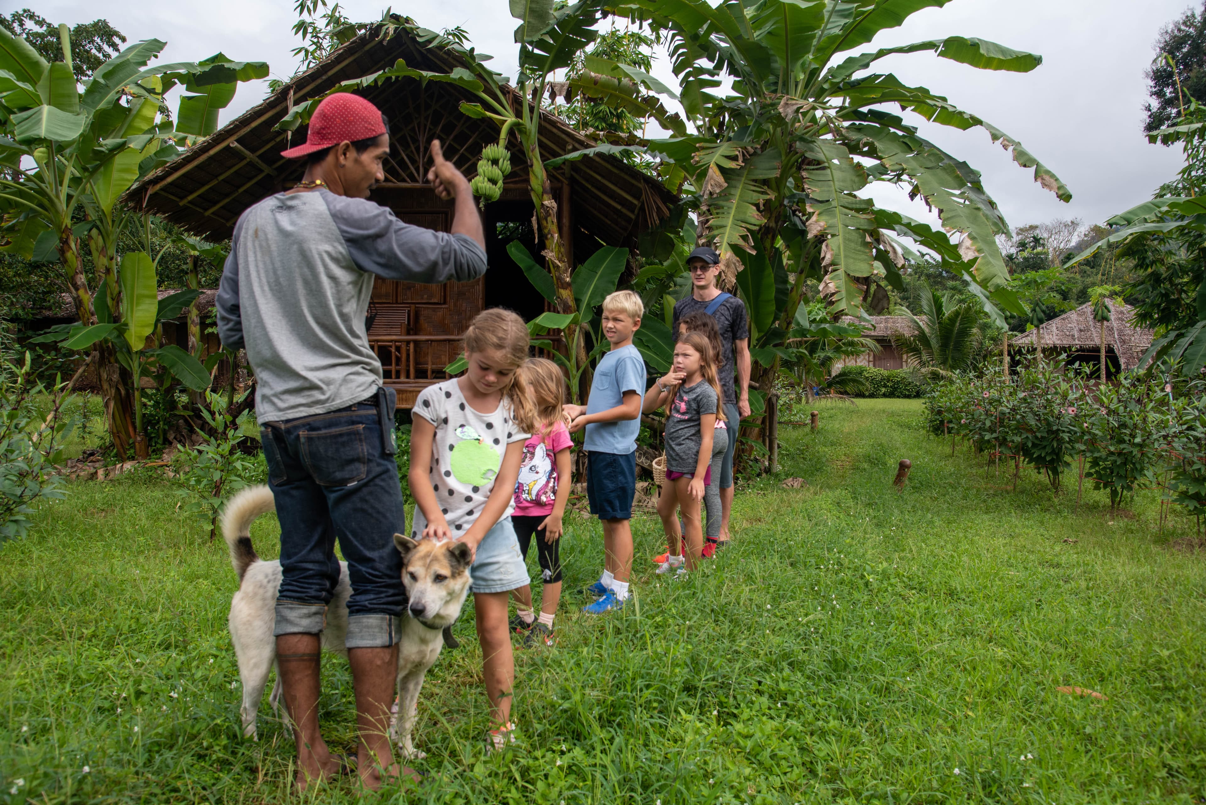 Kids learning about plants in the jungle with a local guide