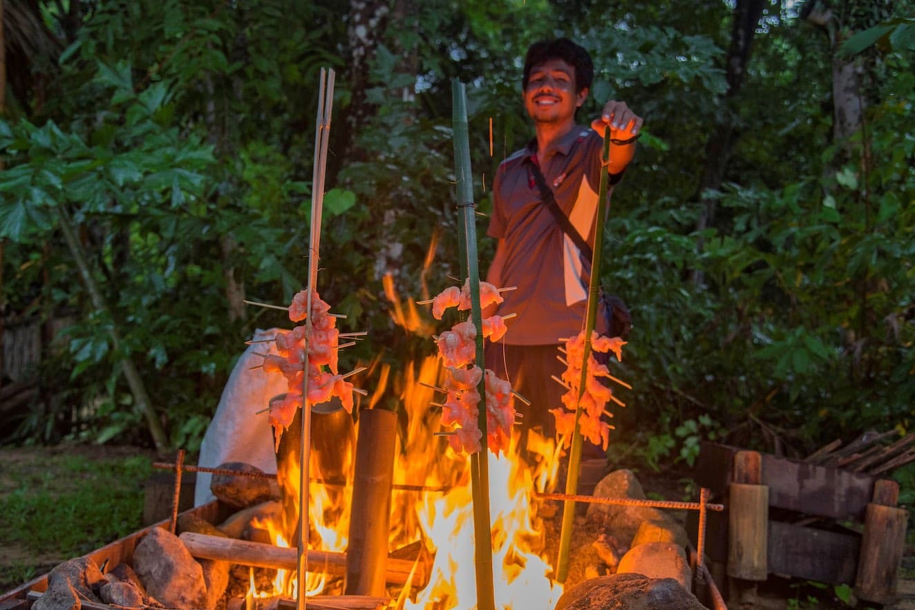 Bamboo cooking over the fire